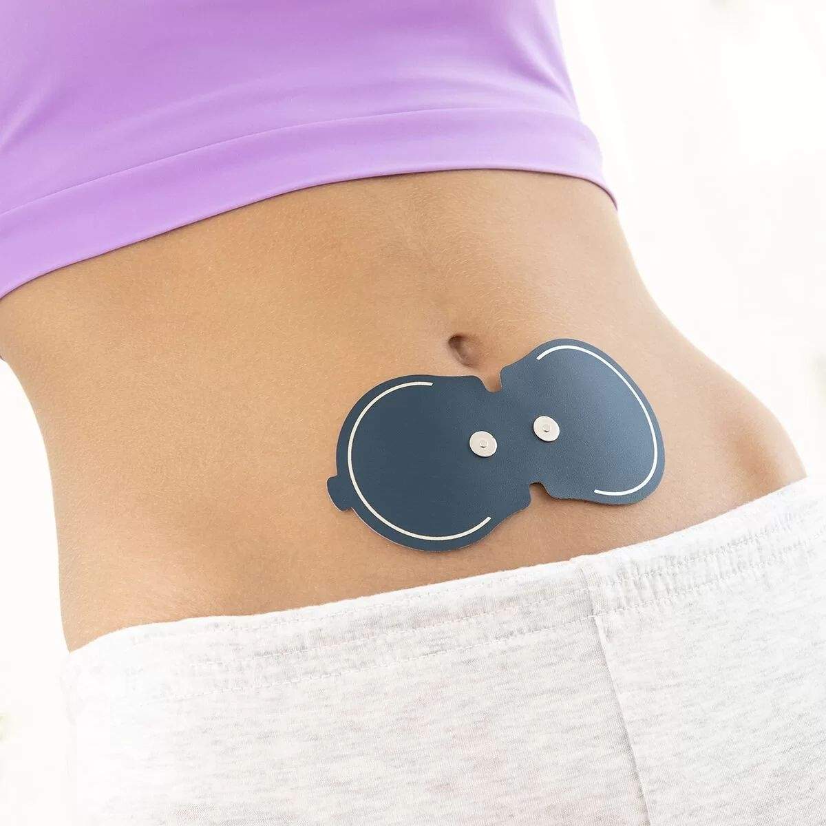 Erstatningsbunker til massageapparat til menstruationssmerter billede