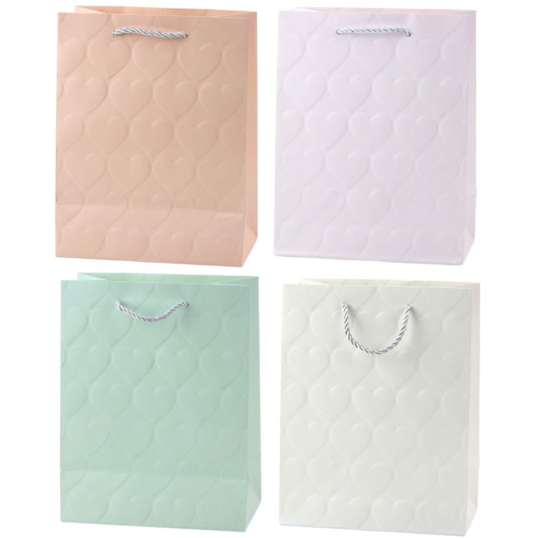 Presentpåse med präglade hjärtan, pastell, 23 x 18 x 10,5 cm | Hem & Hobby | Pryloteket