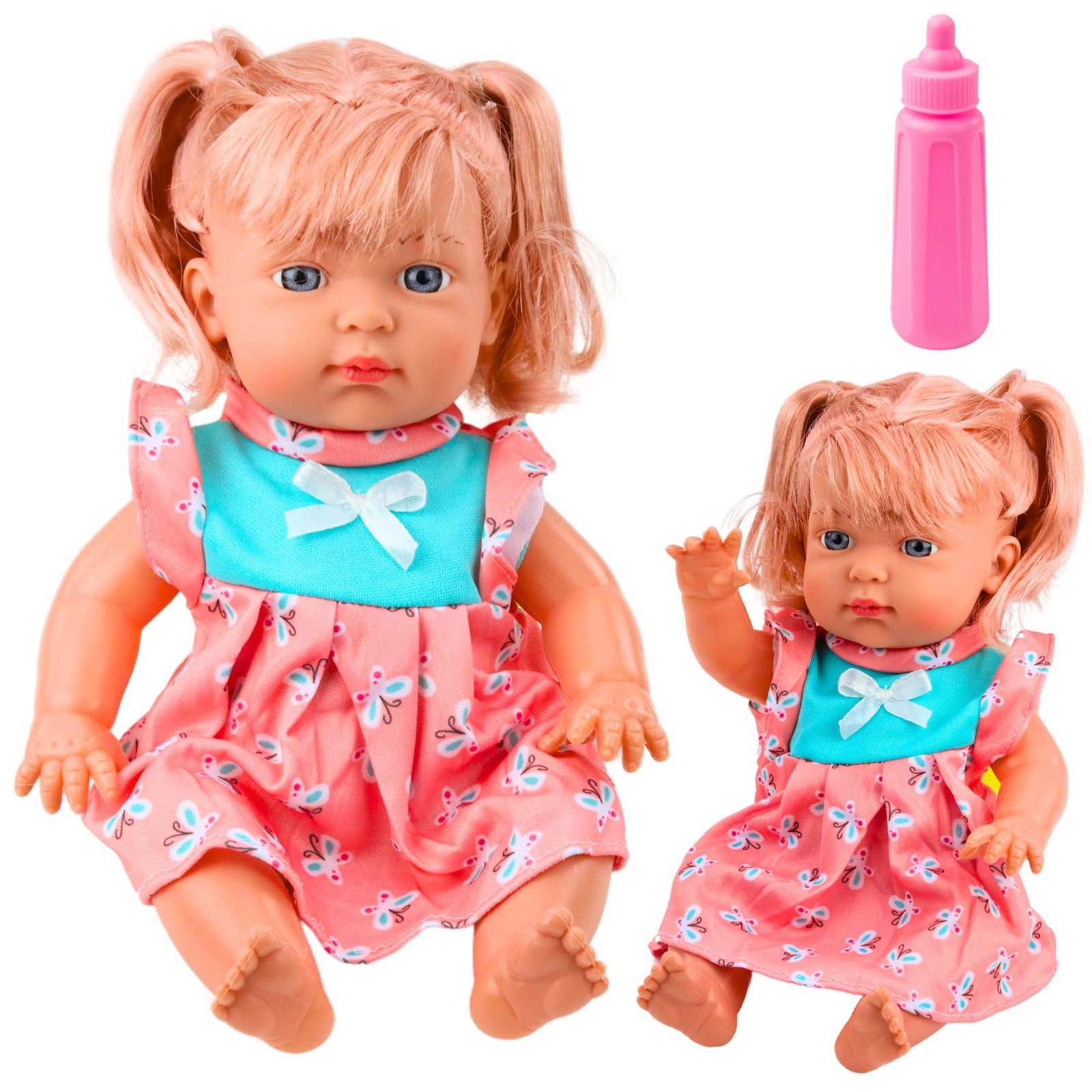 Babydukke med farverig kjole, hestehaler, flaske, lyd