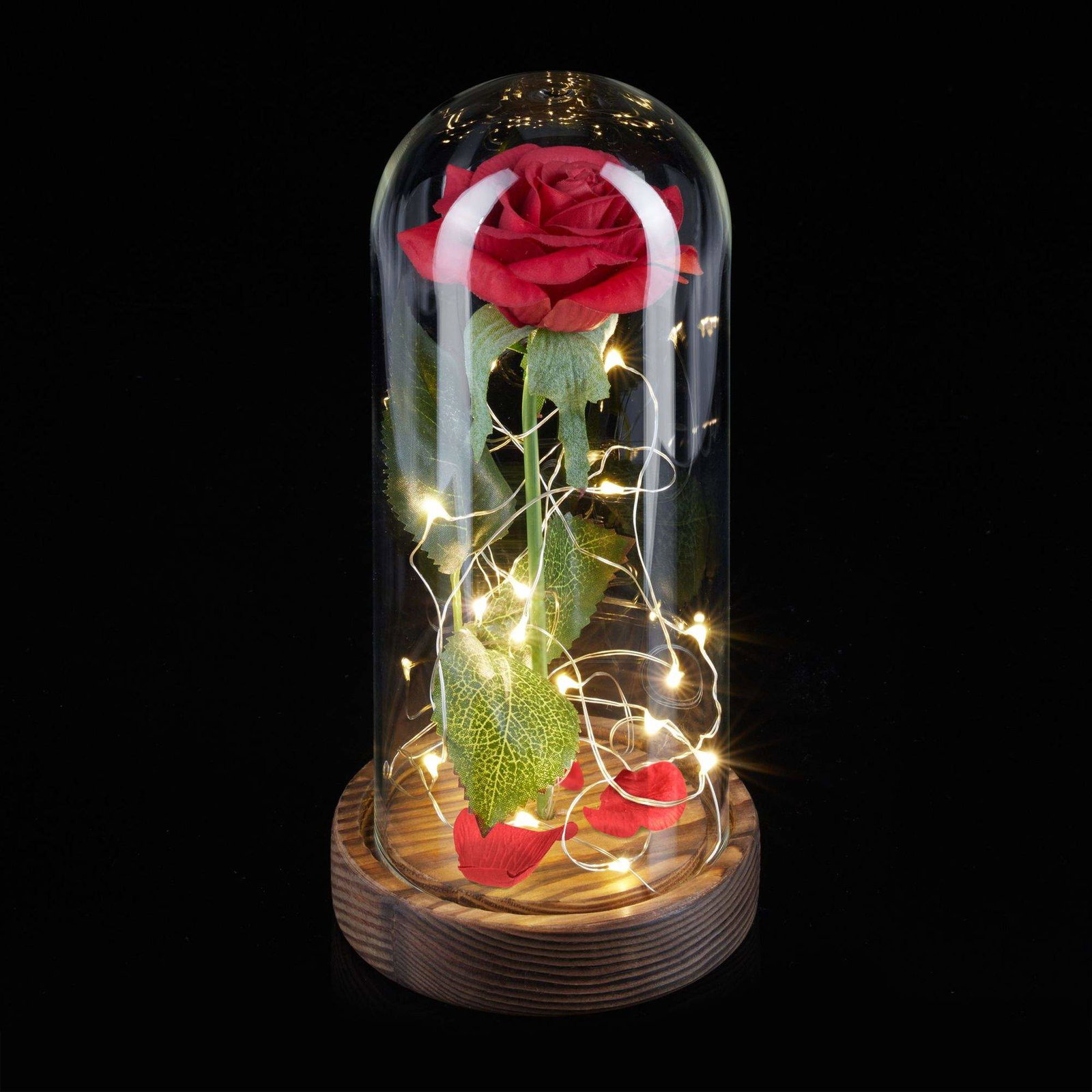 Evig rose i glas med stearinlys